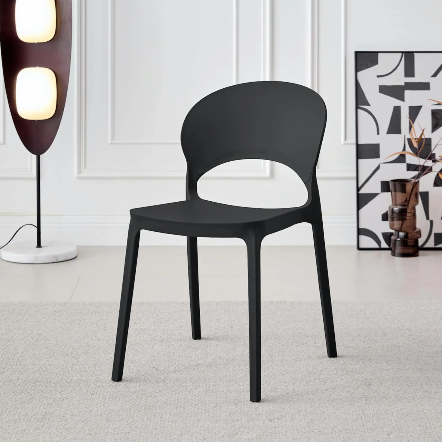 Chaise intérieur/extérieur empilable en résine – noir