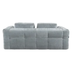 Sofa roulé et compressé dans une boite